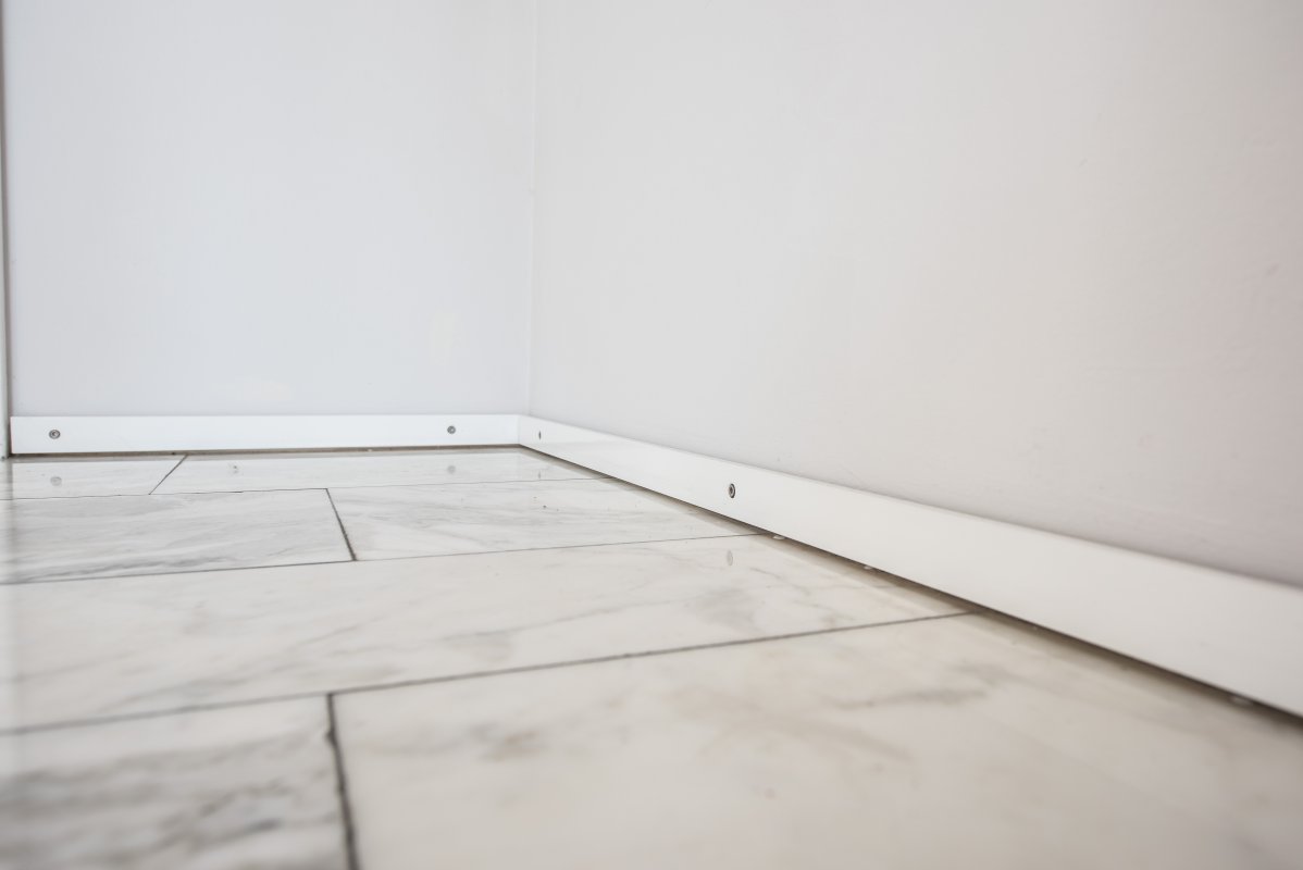 Fußbodenleisten mit doppelter Schattenfuge - Oliver Reifferscheid - Immobilienmakler Darmstadt