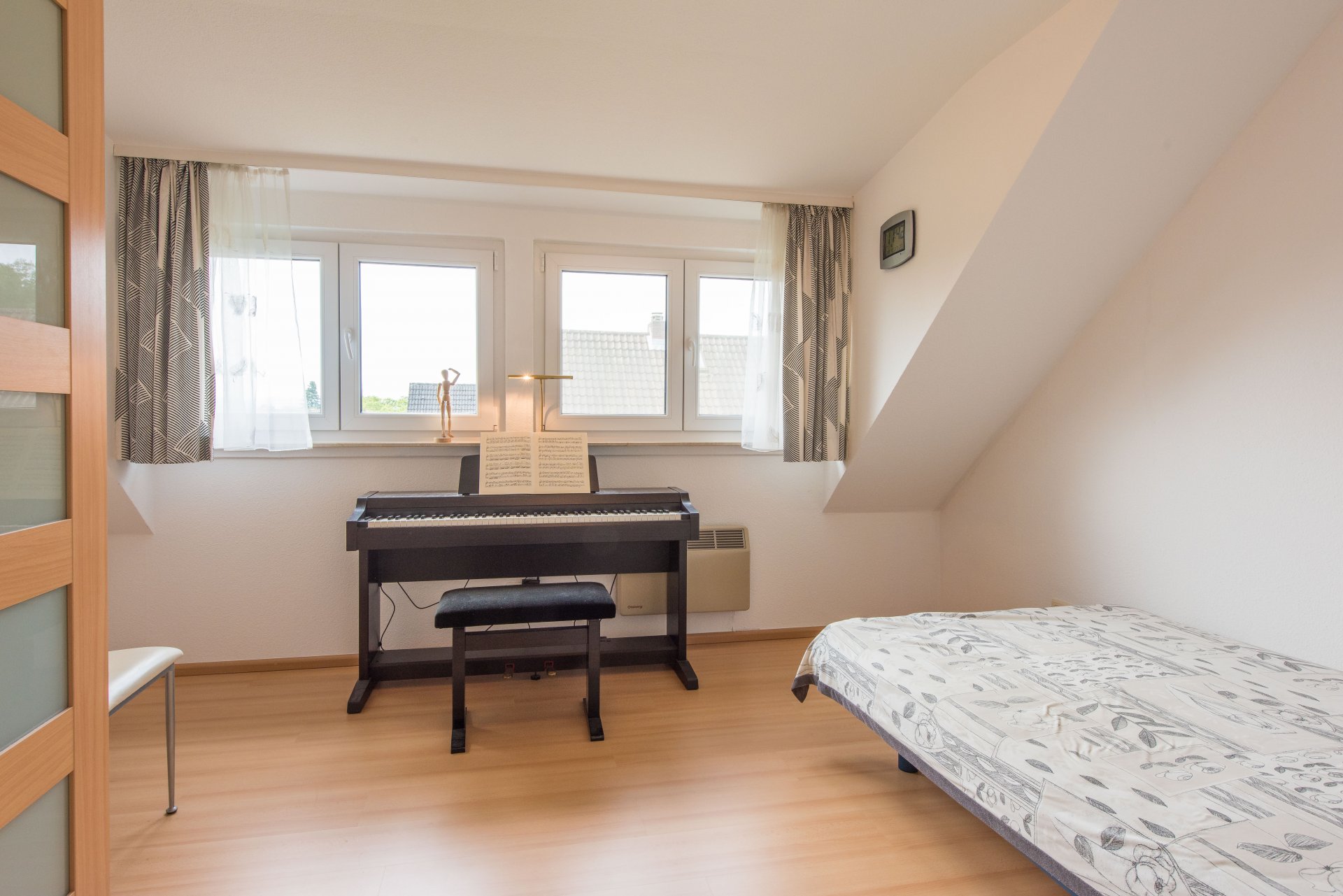 Kinderzimmer mit Dachgaube - Oliver Reifferscheid - Immobilienmakler Darmstadt