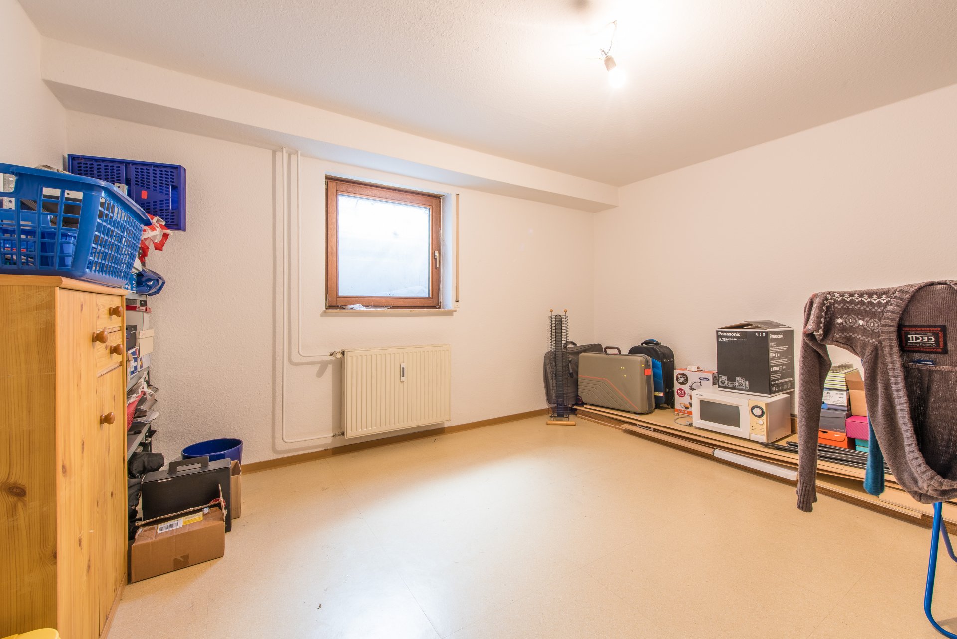 Im Keller haben Sie einen eigenen beheizbaren Hobbyram mit tageslicht und Heizung und einen zusätzlichen Kellerraum - Oliver Reifferscheid - Immobilienmakler Darmstadt