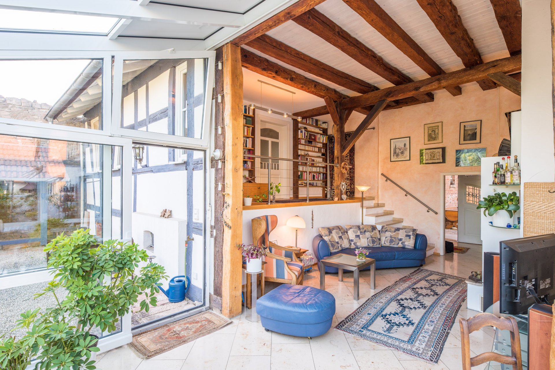 Wintergarten und Wohnzimmer mit Überhöhe - Oliver Reifferscheid - Immobilienmakler Darmstadt