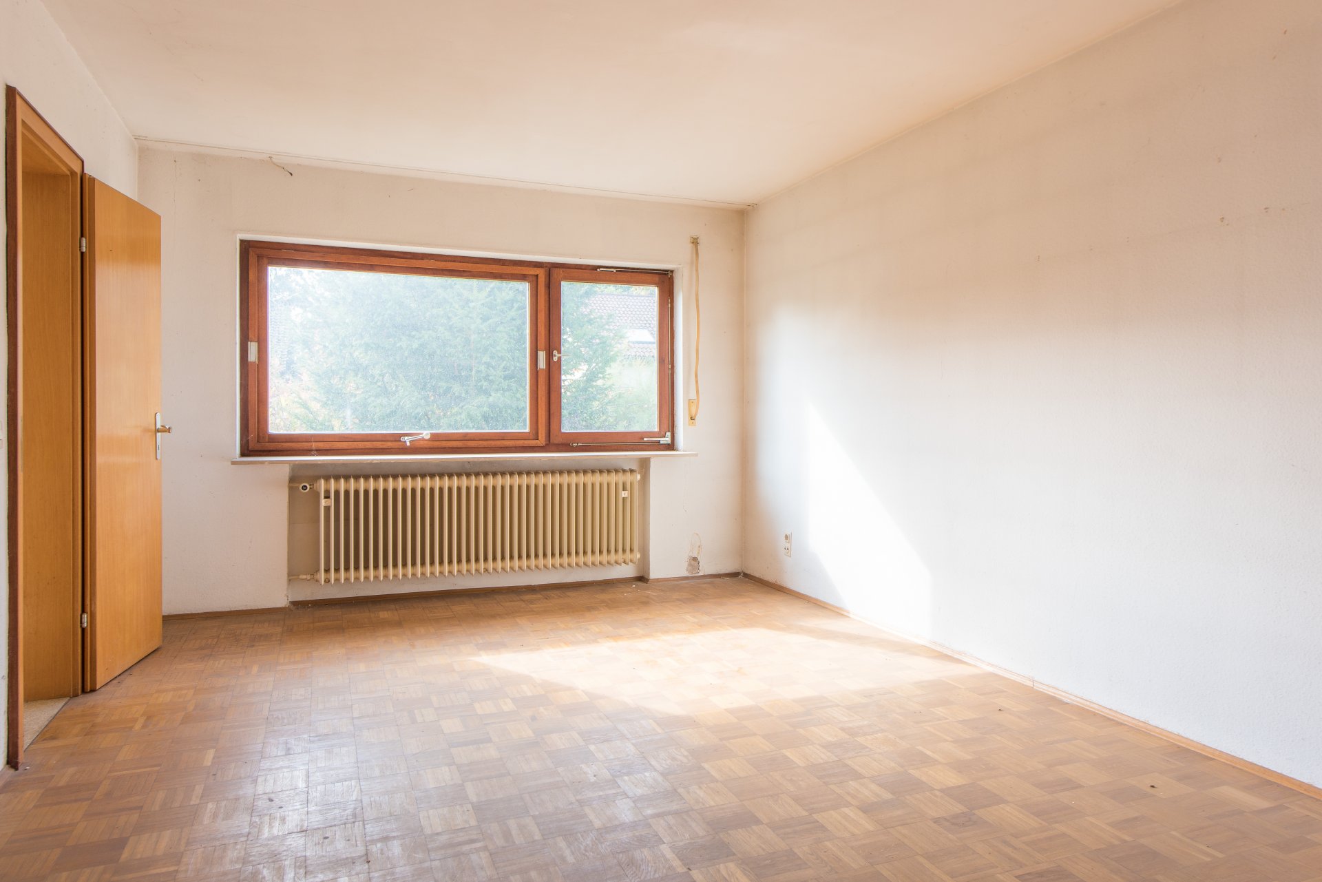 Wohnzimmer im Gartengeschoss - Oliver Reifferscheid - Immobilienmakler Darmstadt